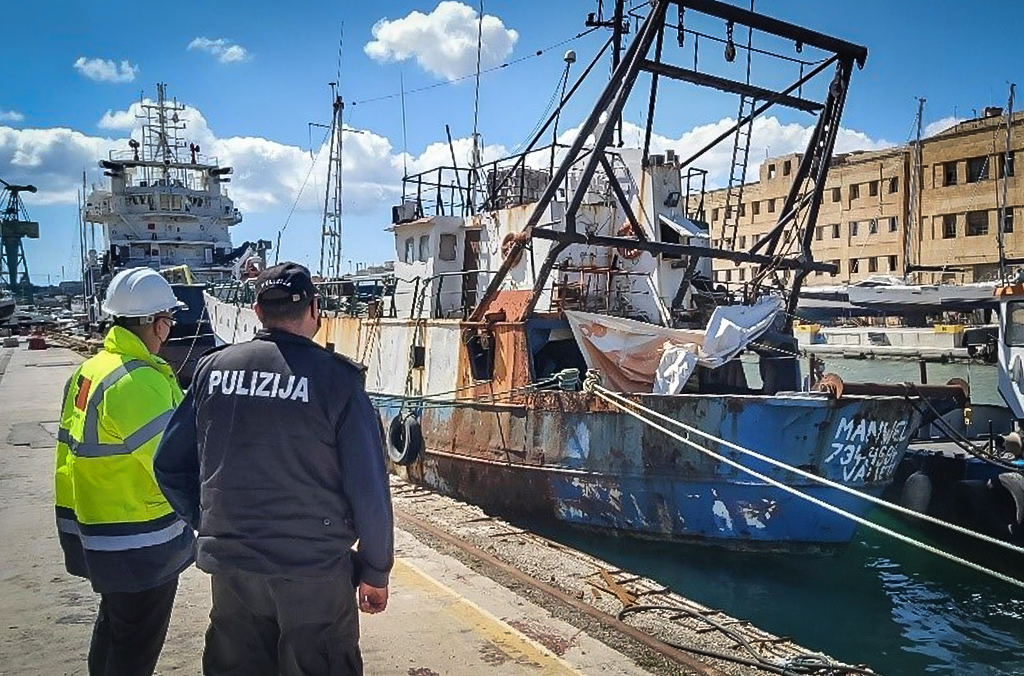 Authorities in Malta investigate a derelict vessel.